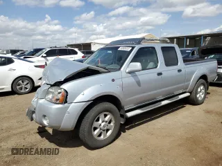 2003 Nissan Frontier SE z VIN 1N6ED29XX3C431323, wystawiony jako Copart lot #55888655 z przebiegiem 69 361 mil mil oraz Szkoda całkowita • Salvage title. Historia ofert i sprzedaży dostępna na DreamBid. Obrazek 1.
