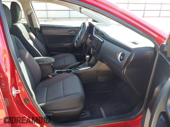 2018 Toyota Corolla L z VIN 5YFBURHE9JP790181, wystawiony jako IAAI lot #41982399 z przebiegiem 79 536 mil mil oraz . Historia ofert i sprzedaży dostępna na DreamBid. Obrazek 5.