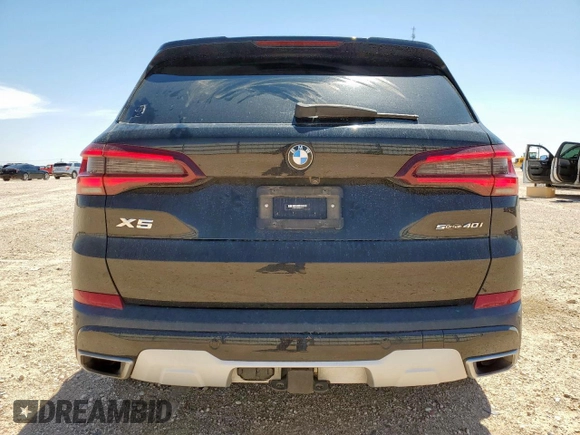 2021 BMW X5 sDrive40i with VIN 5UXCR4C09M9G23111, listed as a Copart auction lot 60509475 with 34,230 mi miles and Salvage title. Bid and sale history available at DreamBid. Image 6.
