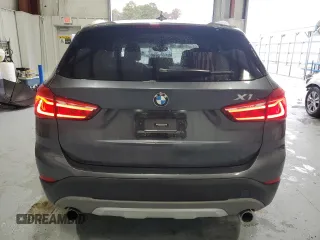 2017 BMW X1 xDrive28i with VIN WBXHT3C38H5F73265, listed as a Copart auction lot 45148825 with 95,850 mi miles and Salvage Title. Bid and sale history available at carsss.com. Image 6.