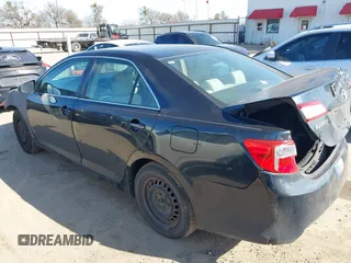 2012 Toyota Camry L with VIN 4T4BF1FKXCR212957, listed as a IAAI auction lot 41672878 with 245,407 mi miles. Bid and sale history available at carsss.com. Image 3.