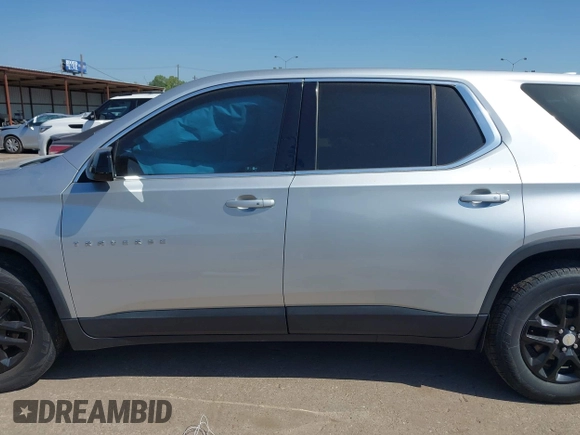 2018 Chevrolet Traverse LS z VIN 1GNERFKWXJJ120682, wystawiony jako IAAI lot #42007628 z przebiegiem 112 795 mil mil oraz . Historia ofert i sprzedaży dostępna na DreamBid. Obrazek 14.