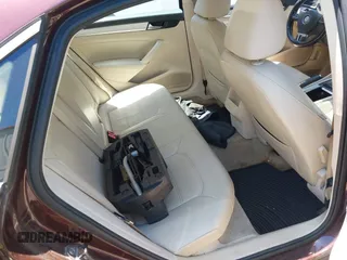2012 Volkswagen Passat SE z VIN 1VWBP7A30CC107216, wystawiony jako IAAI lot #42545676 z przebiegiem 151 417 mil mil oraz . Historia ofert i sprzedaży dostępna na DreamBid. Obrazek 8.
