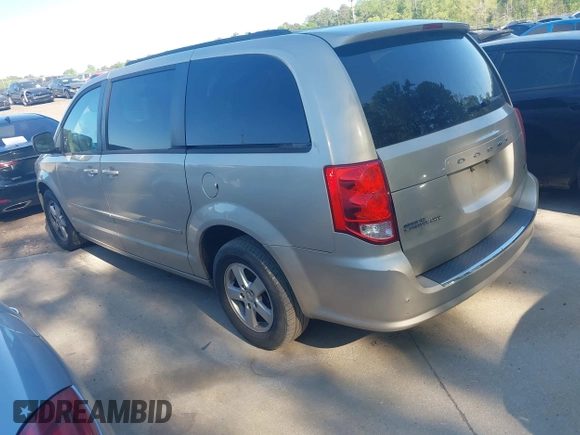 2013 Dodge Grand Caravan SXT with VIN 2C4RDGCGXDR553019, listed as a IAAI auction lot 42053186 with 341,864 mi miles and . Bid and sale history available at DreamBid. Image 3.