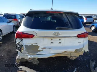2019 Hyundai Santa Fe SE with VIN 5NMS2CAD2KH020288, listed as a IAAI auction lot 41398304 with 136,693 mi miles and . Bid and sale history available at DreamBid. Image 17.