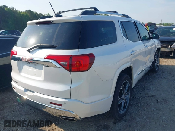 2018 GMC Acadia Denali with VIN 1GKKNPLS3JZ148659, listed as a IAAI auction lot 42158711 with 104,698 mi miles and . Bid and sale history available at DreamBid. Image 4.