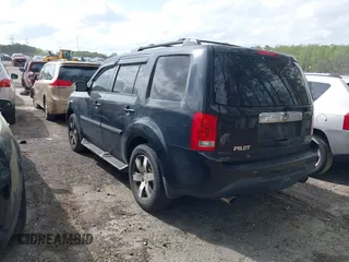 2012 Honda Pilot Touring with VIN 5FNYF4H92CB051260, listed as a IAAI auction lot 41906802 with 256,691 mi miles. Bid and sale history available at carsss.com. Image 3.
