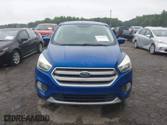 2017 Ford Escape SE z VIN 1FMCU0GD0HUD03757, wystawiony jako IAAI lot #42410990 z przebiegiem 188 884 mil mil oraz . Historia ofert i sprzedaży dostępna na DreamBid. Obrazek 12.