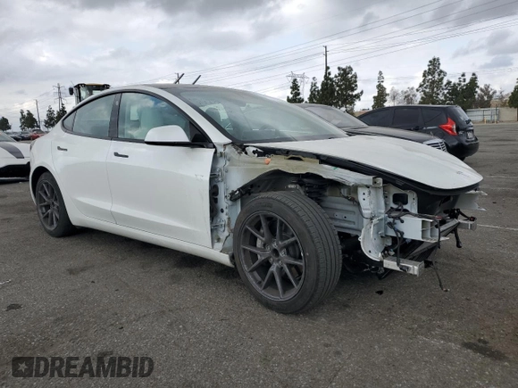 2021 Tesla Model 3 Standard Range Plus with VIN 5YJ3E1EA6MF066064, listed as a Copart auction lot 54063625 with 27,424 mi miles and Salvage Title. Bid and sale history available at DreamBid. Image 4.
