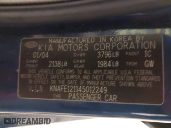 2004 Kia Spectra LX with VIN KNAFE121145012249, listed as a IAAI auction lot 42032571 with 146,748 mi miles. Bid and sale history available at carsss.com. Image 9.