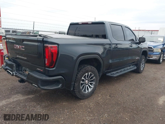 2021 GMC Sierra 1500 AT4 with VIN 1GTP9EED8MZ391803, listed as a IAAI auction lot 41275238 with 84,024 mi miles. Bid and sale history available at carsss.com. Image 4.