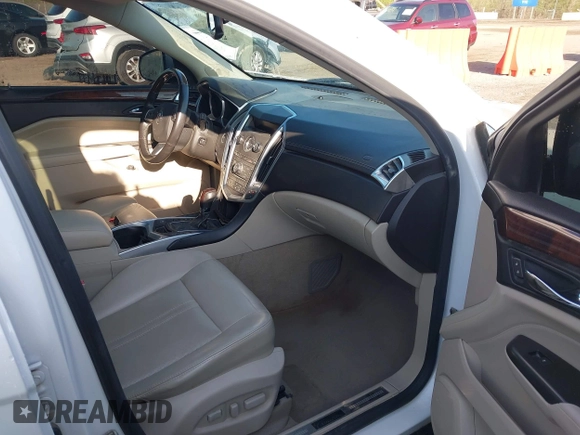 2012 Cadillac SRX Performance Collection with VIN 3GYFNEE35CS561247, listed as a IAAI auction lot 41930292 with 265,599 mi miles and . Bid and sale history available at carsss.com. Image 5.