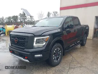 2024 Nissan Titan Pro-4X with VIN 1N6AA1ED6RN118344, listed as a IAAI auction lot 41546438 with 10,163 mi miles and . Bid and sale history available at DreamBid. Image 2.