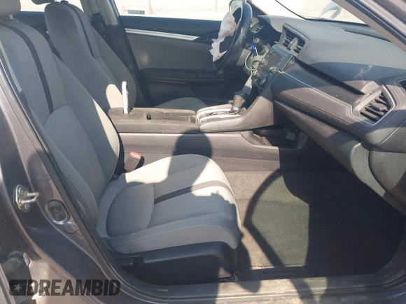 2020 Honda Civic LX with VIN 2HGFC2F65LH505932, listed as a IAAI auction lot 40046863 with 59,768 mi miles and . Bid and sale history available at DreamBid. Image 5.