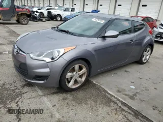 2013 Hyundai Veloster w/Red Int with VIN KMHTC6AD4DU088649, listed as a Copart auction lot 58329295 with 174,798 mi miles and Clean title. Bid and sale history available at DreamBid. Image 1.