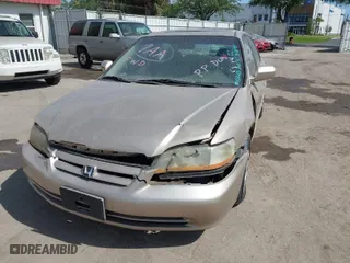 2002 Honda Accord Sdn SE with VIN 1HGCG66812A155003, listed as a IAAI auction lot 41934724 with 192,129 mi miles. Bid and sale history available at carsss.com. Image 6.