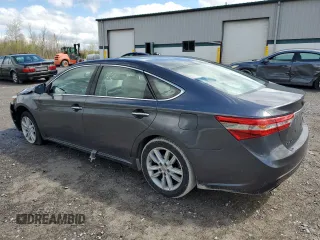 2013 Toyota Avalon XLE with VIN 4T1BK1EB4DU058433, listed as a Copart auction lot 55787335 with 162,204 mi miles and Salvage Title. Bid and sale history available at DreamBid. Image 2.