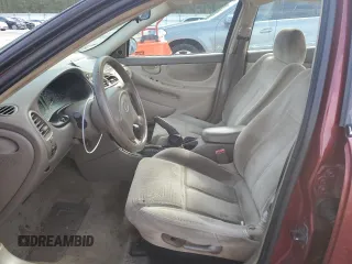 2002 Oldsmobile Alero GL1 z VIN 1G3NL52F92C221691, wystawiony jako Copart lot #88012125 z przebiegiem 249 598 mil mil oraz Szkoda całkowita • Salvage title. Historia ofert i sprzedaży dostępna na DreamBid. Obrazek 7.