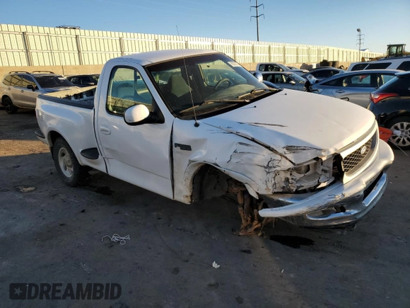 1997 Ford F-150 XL with VIN 1FTDF08W3VKD54292, listed as a Copart auction lot 80205784 with 186,944 mi miles and Salvage Title. Bid and sale history available at carsss.com. Image 4.