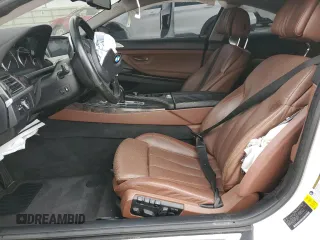 2012 BMW 6 Series 650i z VIN WBALX3C50CC528560, wystawiony jako Copart lot #81046454 z przebiegiem Nie podano mil oraz Nie do naprawy • Non repairable. Historia ofert i sprzedaży dostępna na DreamBid. Obrazek 7.