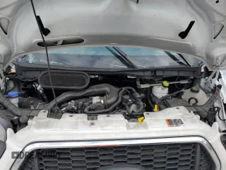 2023 Ford Transit Cargo with VIN 1FTBR1Y82PKB56604, listed as a Copart auction lot 50419485 with 24,546 mi miles and Clean Title. Bid and sale history available at DreamBid. Image 12.