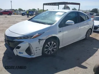 2021 Toyota Prius LE with VIN JTDKAMFP2M3177459, listed as a IAAI auction lot 42093828 with 65,501 mi miles and . Bid and sale history available at DreamBid. Image 17.