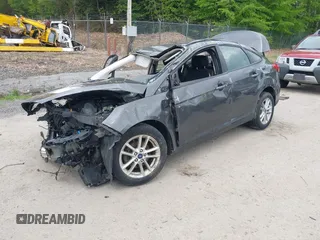 2016 Ford Focus SE z VIN 1FADP3F22GL327604, wystawiony jako IAAI lot #42319889 z przebiegiem 97 736 mil mil oraz . Historia ofert i sprzedaży dostępna na DreamBid. Obrazek 17.
