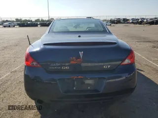 2009 Pontiac G6 with VIN 1G2ZK36NX94268084, listed as a Copart auction lot 70963194 with 120,696 mi miles and Salvage title. Bid and sale history available at DreamBid. Image 6.