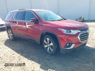 2018 Chevrolet Traverse LT z VIN 1GNERHKW1JJ186565, wystawiony jako IAAI lot #42023809 z przebiegiem 132 159 mil mil oraz . Historia ofert i sprzedaży dostępna na DreamBid. Obrazek 1.