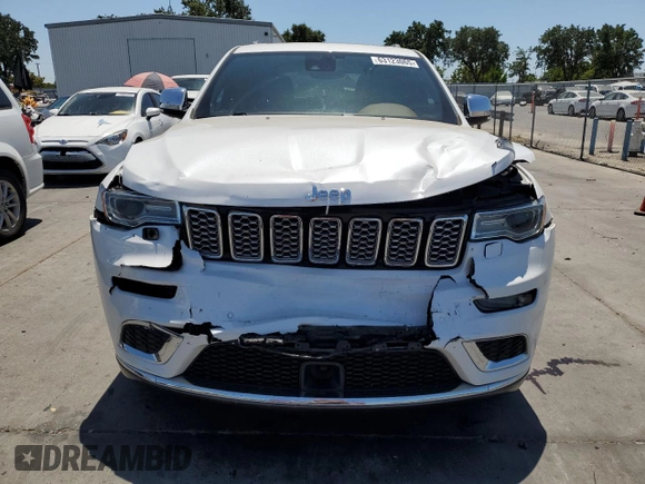 2018 Jeep Grand Cherokee Summit with VIN 1C4RJEJG9JC212554, listed as a Copart auction lot 63123065 with 82,976 mi miles and Salvage title. Bid and sale history available at DreamBid. Image 5.