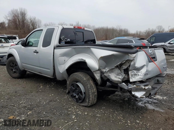 2005 Nissan Frontier LE with VIN 1N6AD06W35C434095, listed as a Copart auction lot 82559744 with 136,085 mi miles and Salvage title. Bid and sale history available at DreamBid. Image 2.