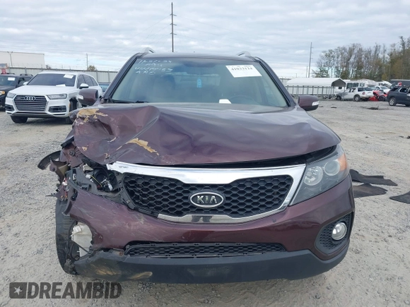 2013 Kia Sorento EX with VIN 5XYKU4A21DG312753, listed as a IAAI auction lot 41033124 with 197,459 mi miles and . Bid and sale history available at carsss.com. Image 12.
