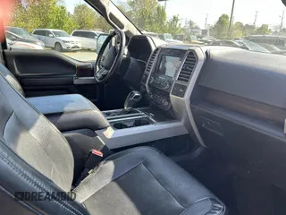 2016 Ford F-150 XLT with VIN 1FTFW1EG4GKE48227, listed as a IAAI auction lot 41907752 with 233,964 mi miles. Bid and sale history available at carsss.com. Image 5.