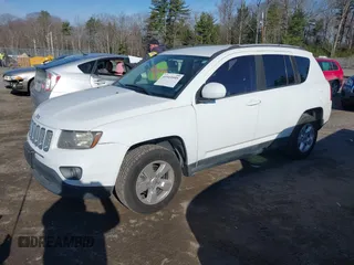 2016 Jeep Compass High Altitude Edition with VIN 1C4NJCEA6GD666790, listed as a IAAI auction lot 41919595 with 164,835 mi miles. Bid and sale history available at carsss.com. Image 2.