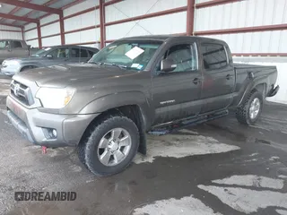 2014 Toyota Tacoma with VIN 3TMMU4FN4EM072128, listed as a IAAI auction lot 42479725 with 287,877 mi miles and . Bid and sale history available at DreamBid. Image 2.