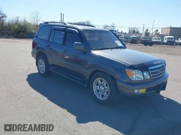 2003 Lexus LX with VIN JTJHT00W033531066, listed as a IAAI auction lot 41969617 with 209,710 mi miles. Bid and sale history available at carsss.com. Image 1.