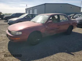 1994 Toyota Camry LE z VIN 4T1SK12E5RU327562, wystawiony jako Copart lot #54372185 z przebiegiem 180 578 mil mil oraz Szkoda całkowita • Salvage title. Historia ofert i sprzedaży dostępna na DreamBid. Obrazek 1.