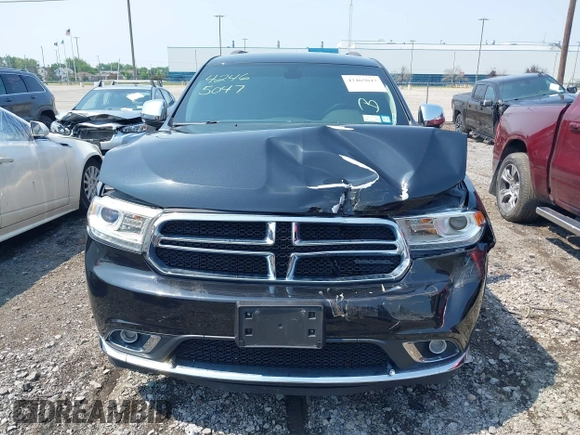 2014 Dodge Durango Limited with VIN 1C4RDJDG5EC532942, listed as a IAAI auction lot 42465047 with 116,617 mi miles and . Bid and sale history available at DreamBid. Image 12.