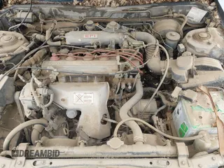 1990 Toyota Camry DLX z VIN 4T1SV21EXLU271320, wystawiony jako IAAI lot #41798353 z przebiegiem 269 178 mil mil oraz . Historia ofert i sprzedaży dostępna na DreamBid. Obrazek 10.