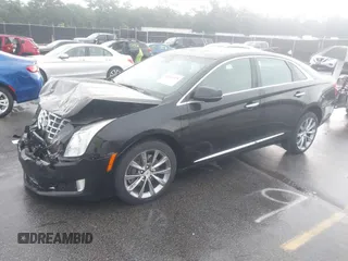 2013 Cadillac XTS Premium z VIN 2G61S5S39D9112491, wystawiony jako IAAI lot #42216373 z przebiegiem 145 338 mil mil oraz . Historia ofert i sprzedaży dostępna na DreamBid. Obrazek 17.