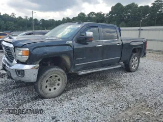 2017 GMC Sierra 2500HD SLT with VIN 1GT12TEY4HF138132, listed as a Copart auction lot 64664344 with 265,380 mi miles and Salvage Title. Bid and sale history available at carsss.com. Image 1.