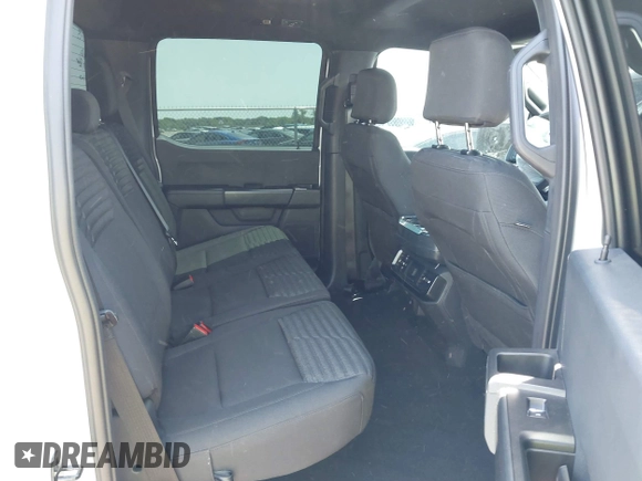 2023 Ford F-150 XL with VIN 1FTEW1CP5PKF42521, listed as a IAAI auction lot 42257062 with 30,758 mi miles and . Bid and sale history available at DreamBid. Image 8.