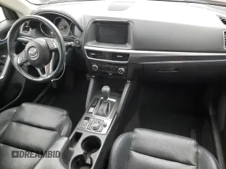 2016 Mazda CX-5 Grand Touring with VIN JM3KE4DY9G0771088, listed as a Copart auction lot 50615495 with 93,221 mi miles and Salvage Title. Bid and sale history available at DreamBid. Image 8.
