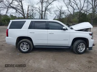 2020 Chevrolet Tahoe LT with VIN 1GNSKBKC2LR253012, listed as a IAAI auction lot 41870002 with 127,789 mi miles and . Bid and sale history available at DreamBid. Image 13.