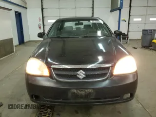 2008 Suzuki Forenza z VIN KL5JD56Z48K957359, wystawiony jako Copart lot #79184084 z przebiegiem 142 632 mil mil oraz Tytuł czysty. Historia ofert i sprzedaży dostępna na DreamBid. Obrazek 5.