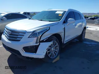 2017 Cadillac XT5 Luxury AWD z VIN 1GYKNDRS8HZ120863, wystawiony jako IAAI lot #42101279 z przebiegiem 100 535 mil mil oraz . Historia ofert i sprzedaży dostępna na DreamBid. Obrazek 18.