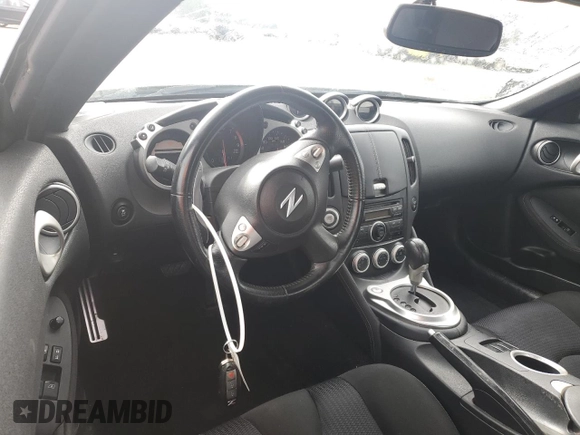 2012 Nissan 370Z z VIN JN1AZ4EHXCM562486, wystawiony jako Copart lot #44594005 z przebiegiem 79 150 mil mil oraz Szkoda całkowita • Salvage title. Historia ofert i sprzedaży dostępna na DreamBid. Obrazek 8.