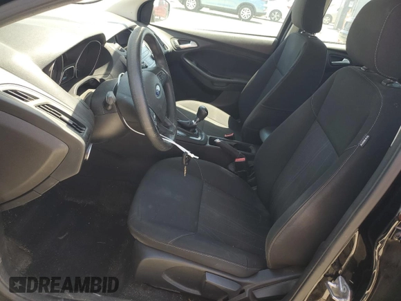 2018 Ford Focus SE with VIN 1FADP3FE8JL205699, listed as a Copart auction lot 63300795 with 128,877 mi miles and Clean title. Bid and sale history available at DreamBid. Image 7.