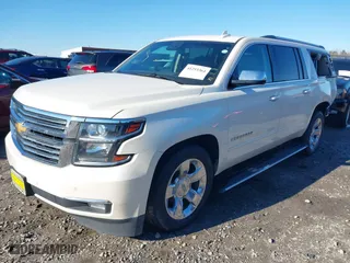 2015 Chevrolet Suburban LTZ with VIN 1GNSKKKC6FR573888, listed as a IAAI auction lot 41253364 with 216,256 mi miles. Bid and sale history available at carsss.com. Image 17.