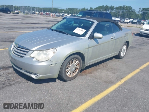 2009 Chrysler Sebring Touring with VIN 1C3LC55D99N574422, listed as a IAAI auction lot 42595676 with 141,603 mi miles and . Bid and sale history available at DreamBid. Image 2.